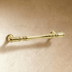 Two decorative cabinet pulls with turned wooden handles shown front view on white background with measurements.