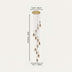 Gold and white multi-pendant chandelier with teardrop-shaped shades suspended from ceiling canopy.