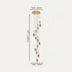 Multi-pendant chandelier with brass and glass teardrop shades cascading from a brass ceiling mount.