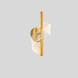 "Modern wall lamp with a spiral acrylic diffuser and a sleek gold metal frame, providing soft, ambient LED lighting."