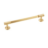 "Angled view of a sleek brass pull bar with grooved detailing, showcasing a sophisticated and timeless design suitable for modern and classic interiors."