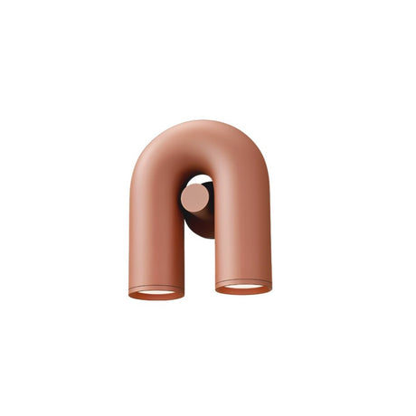 "A red, contemporary wall lamp with a distinctive, looped design and two adjustable lights."