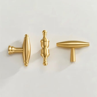 "Elegant brass cabinet knobs with a refined, sculptural design and polished finish."