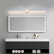 "A modern white wall lamp featuring a geometric centerpiece and a streamlined light bar, positioned above a rectangular mirror in a contemporary bathroom with a dark gray vanity."