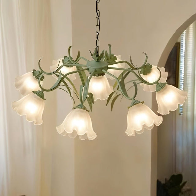 "A nature-inspired chandelier with curved iron stems and frosted glass flower-shaped shades, providing a soft, ambient glow."