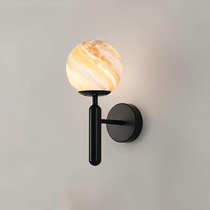 Cosima Modern Black Globe Wall Lamp: With its black metal frame and frosted glass globe shade, this wall lamp offers a contemporary and minimalist look, perfect for modern and industrial-style interiors.