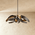 Pendant light fixture with curved petal-shaped shades, shown from front view against white background with dimensions labeled