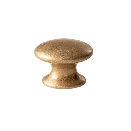 "Vintage solid brass oval knob with a smooth, refined design, suitable for classic cabinetry."
