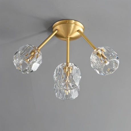 "Modern 4-light ceiling fixture with crystal shades and brass finish."