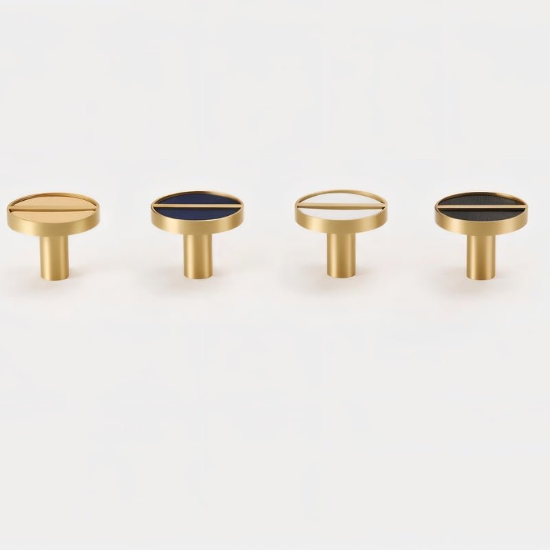 "Set of circular brass and leather cabinet knobs in various colors, showcasing their elegant design and premium materials."