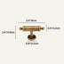 Antique brass cabinet pull with cylindrical handle and round base plate on beige background.