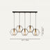 Black metal chandelier with five hexagonal brass-accented pendant lights, suspended from a linear canopy, isolated on white background.