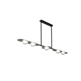 "Copper Dilti pendant light with four glass globes and a black frame, isolated on a white background."