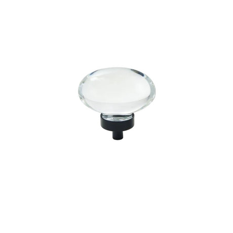 "Clear crystal glass oval knob with smooth texture and black base, isolated on a white background."