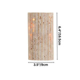 "Dimensions of a minimalist, rectangular travertine wall lamp: 3.5 inches in width and 6.4 inches in height."