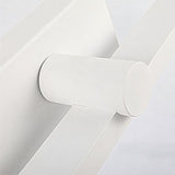 "A close-up view of the Dralis LED vanity light, showcasing its minimalist design and wall-mounted structure."