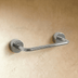 Two-light bathroom vanity fixture with chrome finish and cylindrical shades on white background, front view with dimensions.