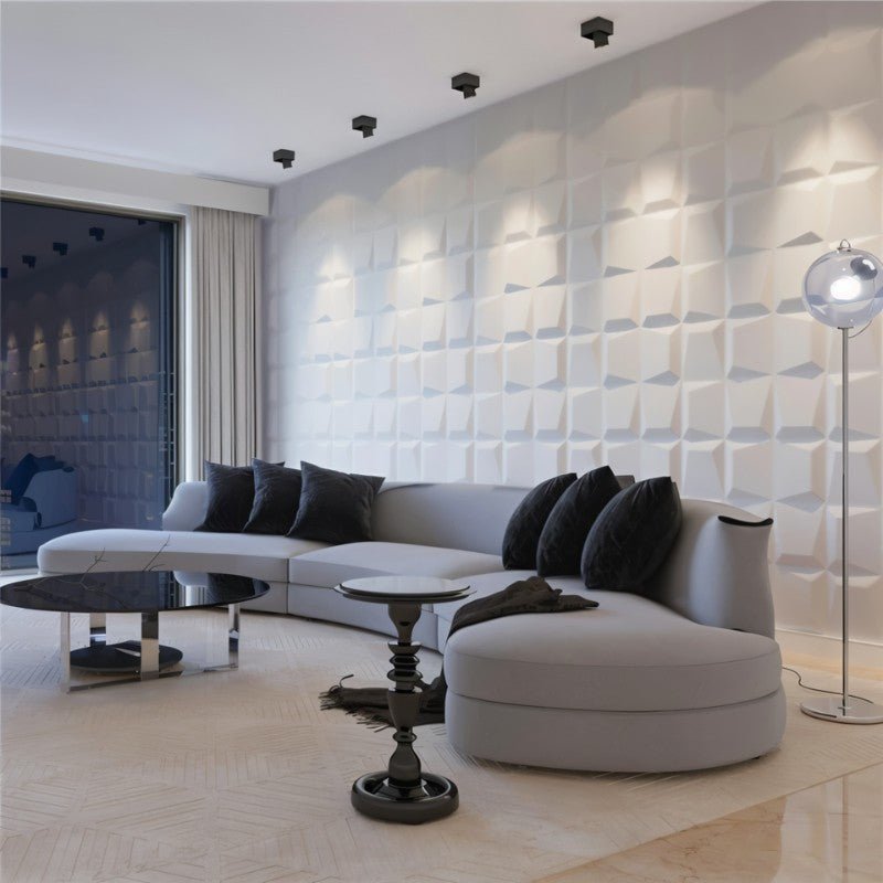 Durven Wall Panel– Stylish, Durable, Waterproof Design installed in a contemporary living room with a curved sofa and black accents.