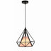 Black geometric pendant light with warm interior glow on white background.