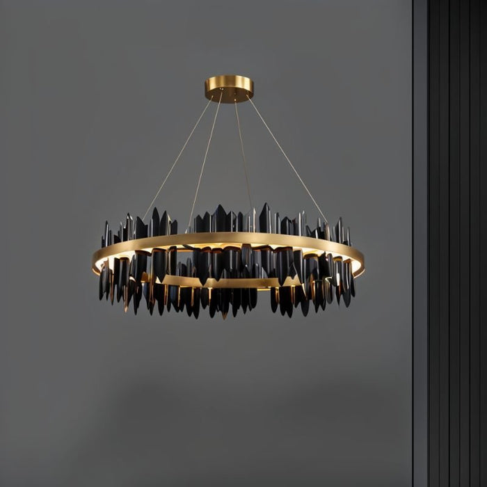 Elaine Tranquility Chandelier: Inspired by the soothing beauty of waterfalls, this chandelier features cascading crystals and rippling waves of polished metal, creating a sense of tranquility and harmony.