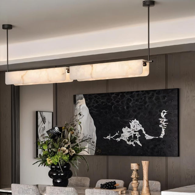 "Linear alabaster pendant light with natural veining in a modern dining room"
