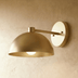 Black dome wall sconce with adjustable arm shown from front and side angles against white background with dimension measureme
