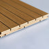 Wooden slat wall panel with natural oak finish and visible layered plywood edges on white background.