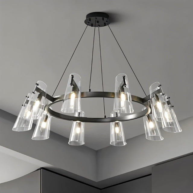 "A modern black brass circular chandelier with cone-shaped acrylic shades on a gray ceiling."