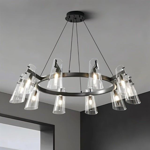 "A modern black brass chandelier with cone-shaped acrylic shades, lit and hanging on a ceiling."