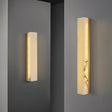 "Two sizes of the Emerson brass wall lamp, showcasing the design's versatility for different spaces and lighting needs."