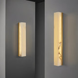 "Two sizes of the Emerson brass wall lamp, showcasing the design's versatility for different spaces and lighting needs."