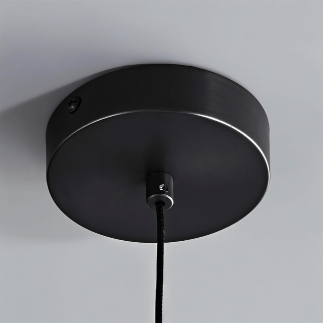Ceiling mount of Emiva Pendant Light in matte black, highlighting the durable iron construction and minimalist design.
