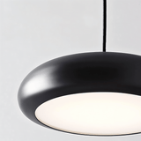 Detailed view of Emiva Pendant Light's LED diffuser, emphasizing its soft glow and modern acrylic and metal build.