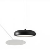 Emiva Pendant Light in matte black finish with minimalist round design, ideal for modern interior lighting and wallpaper-themed decor.