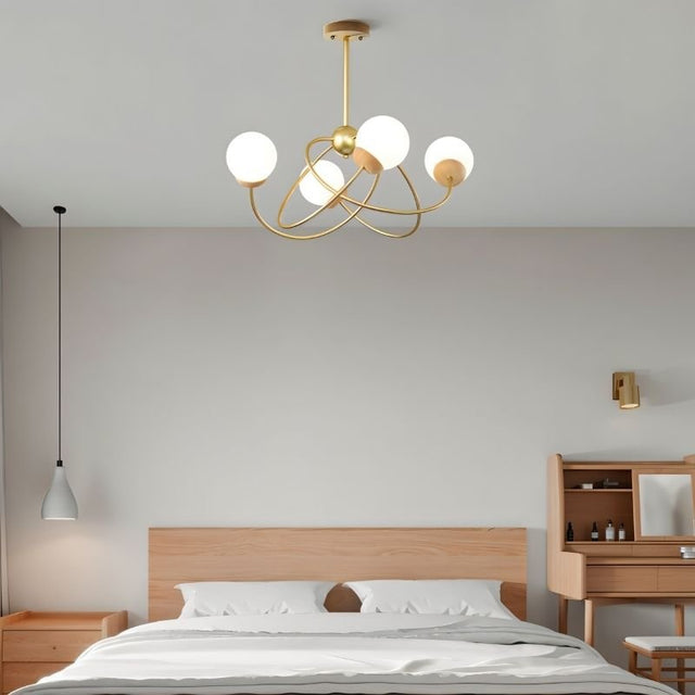 "Modern ceiling light fixture with orbit-inspired metal arms, frosted glass globes, and wood accents for ambient illumination."