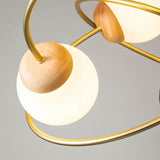 "Statement ceiling light fixture with curved metal arms, ideal for modern home decor and upscale interiors."