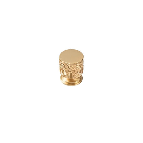 "A gold textured Erdas knob on a white background."