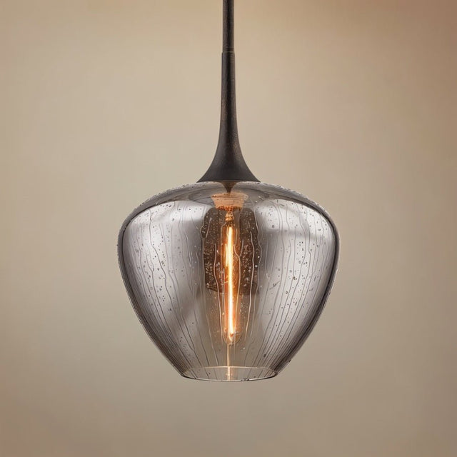 "pendant light illuminating a cozy kitchen or living area"