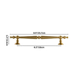 "Dimensions diagram of a brass pull bar with a tapered silhouette and classical details, showing measurements."