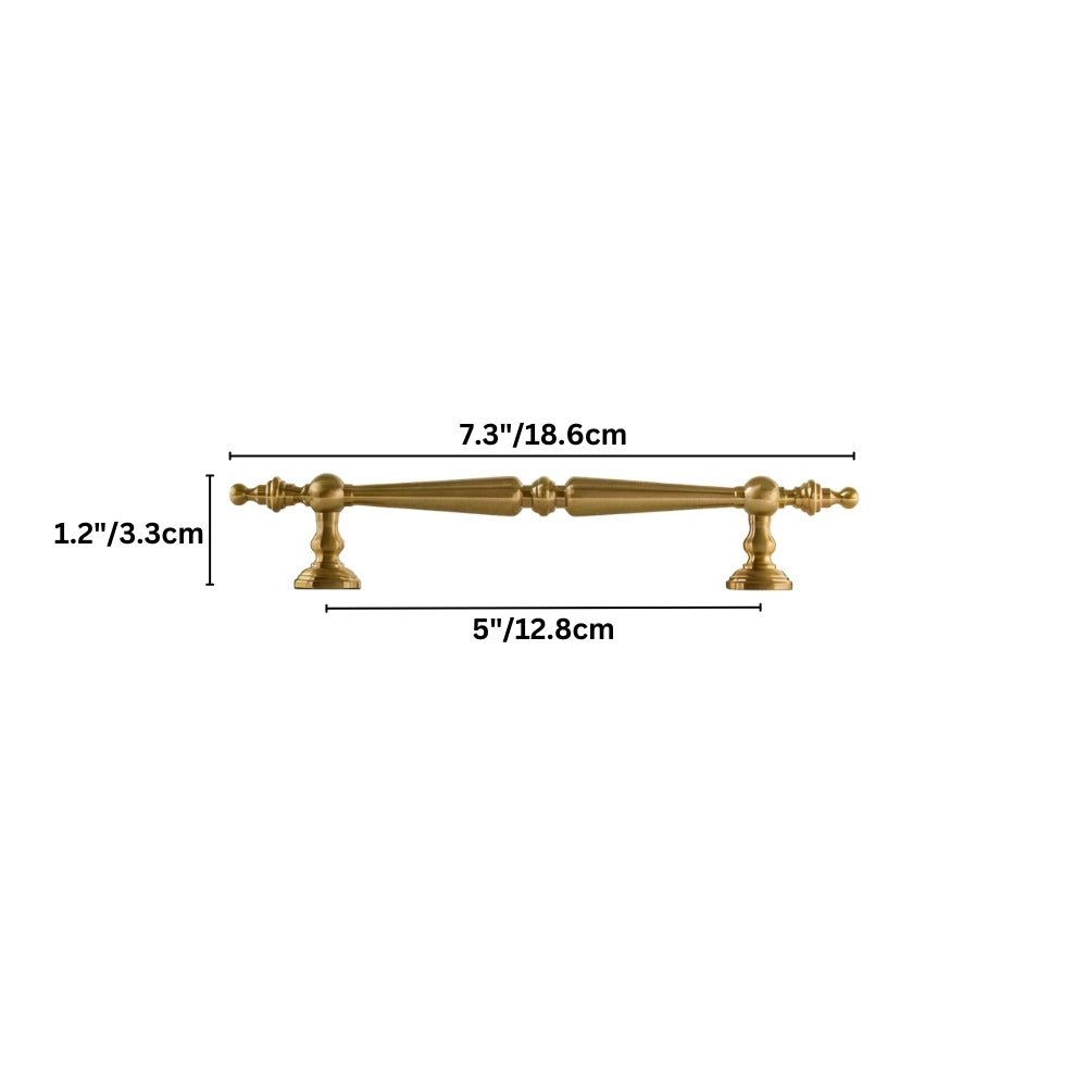 "Brass pull bar handle with a tapered silhouette and intricate classical details, suitable for cabinets or drawers."
