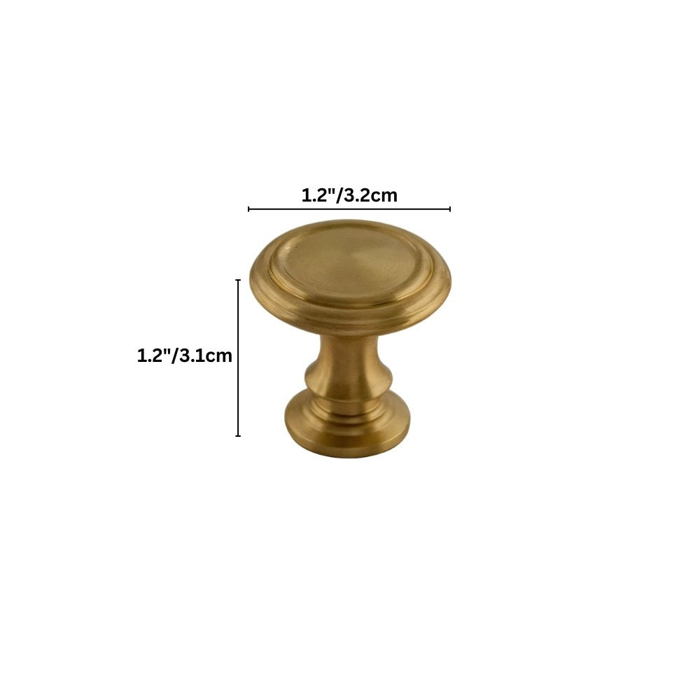 "Brass cabinet knob with a tapered silhouette and intricate classical details, suitable for traditional or transitional interiors."