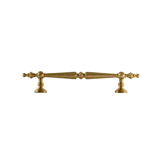 "Brass pull bar with a tapered silhouette and intricate classical details, suitable for cabinets, wardrobes, or drawers."