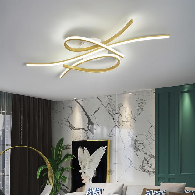 "A modern ceiling light with intertwining LED bars mounted in a stylish living room with patterned walls and furniture."