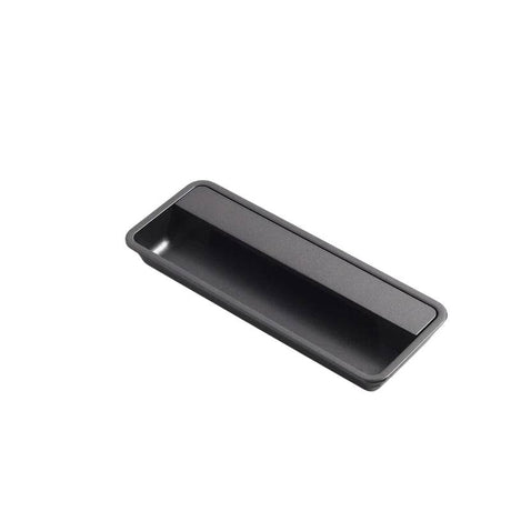 "Dark gray recessed rectangular drawer pull made of aluminum, sleek minimalist design."