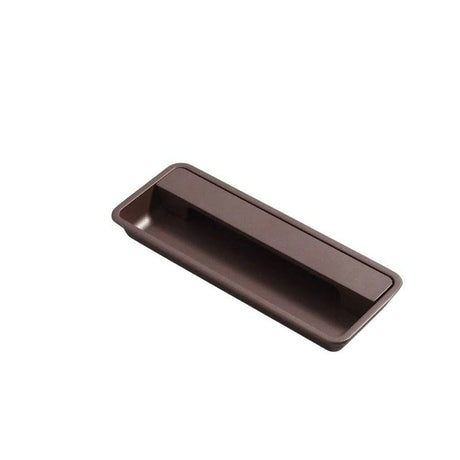 "A brown, minimalist recessed handle made of aluminum alloy, suitable for modern cabinets and drawers."