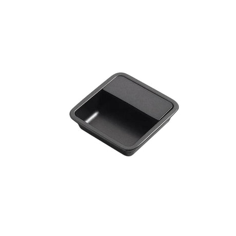 "Black aluminum recessed drawer pull with a minimalist design, isolated on a white background."
