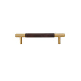 "Modern wood and brass pull bar with a rich wooden core and cylindrical brass caps, isolated on a white background."