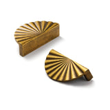 "Two vintage brass fan-shaped drawer pulls made of durable metal with a ridged, pleated surface and intricate grooves, in a half-moon Art Deco-inspired design."