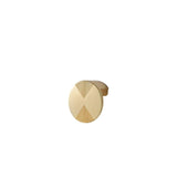"Brass cabinet knob with a bold circular design and etched geometric detailing, isolated on a white background."