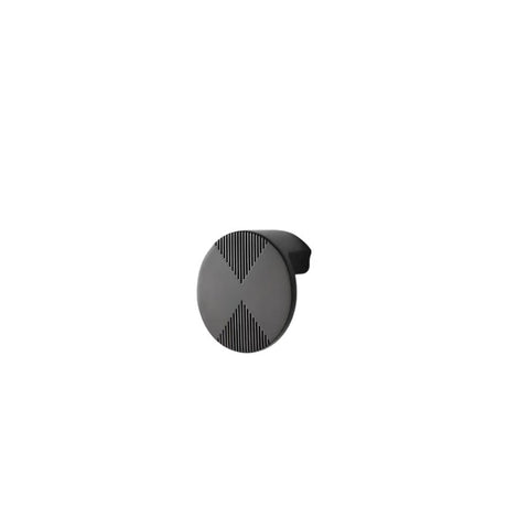 "Gunmetal cabinet knob with a bold circular design and etched geometric detailing, isolated on a white background."